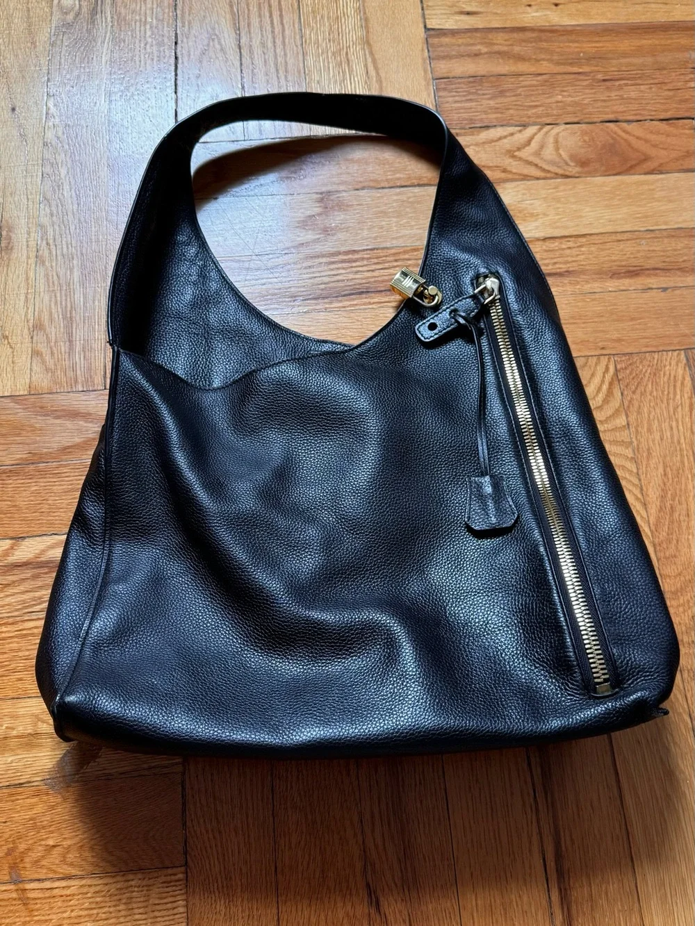 Black Pebbled Leather Shoulder Bag with Gold Zip Accent
